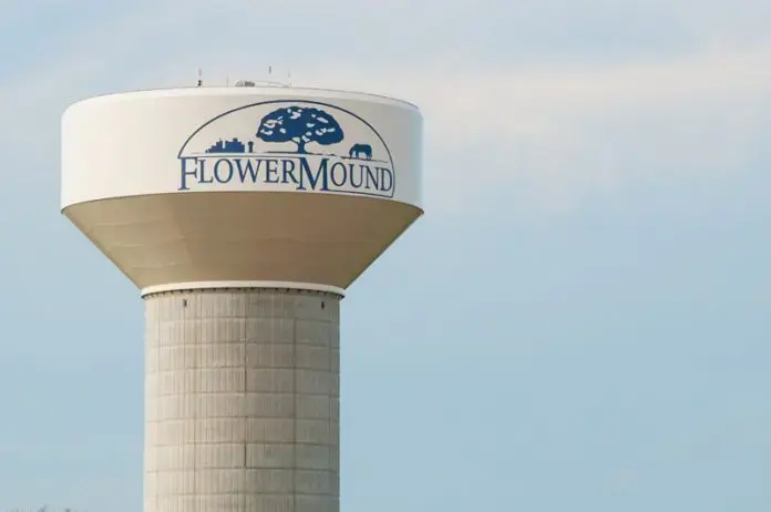 Flower Mound water tower against a pale North Texas sky